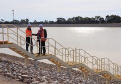 East Gippsland Water representatives at the completed Paynesville winter storage lagoon.